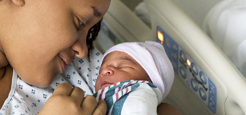 Newborn baby with inguinal hernia