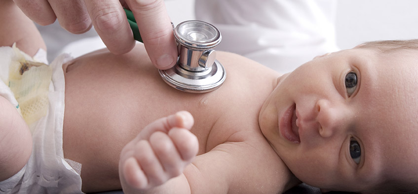 Beaumont pediatrician examines baby