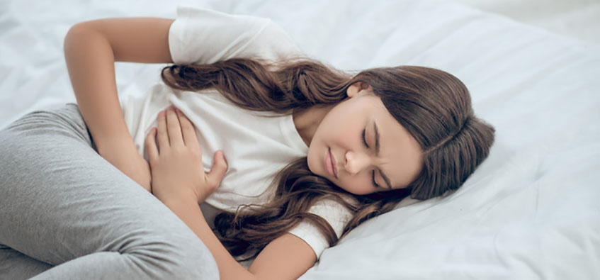 Child experiencing abdominal pain from appendicitis