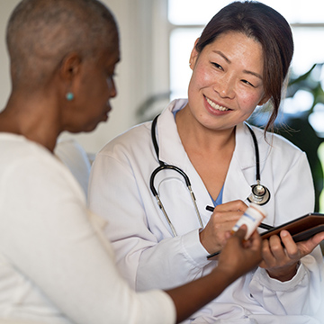 Doctor speaks with female patient
