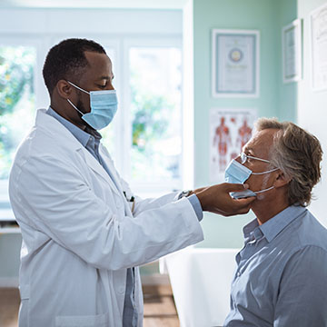 Doctor examines patient