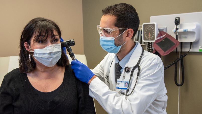 Dr. Karmo with patient
