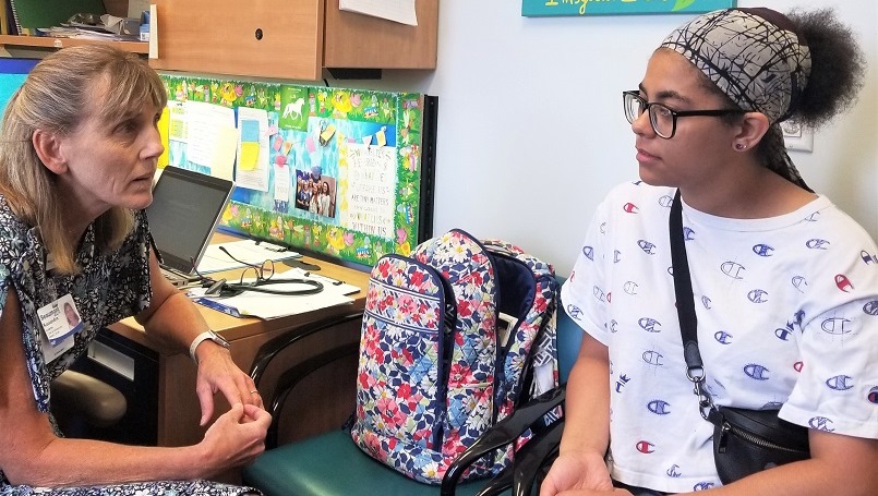 Kassandra Luoma and her patient Adrianna Farmer