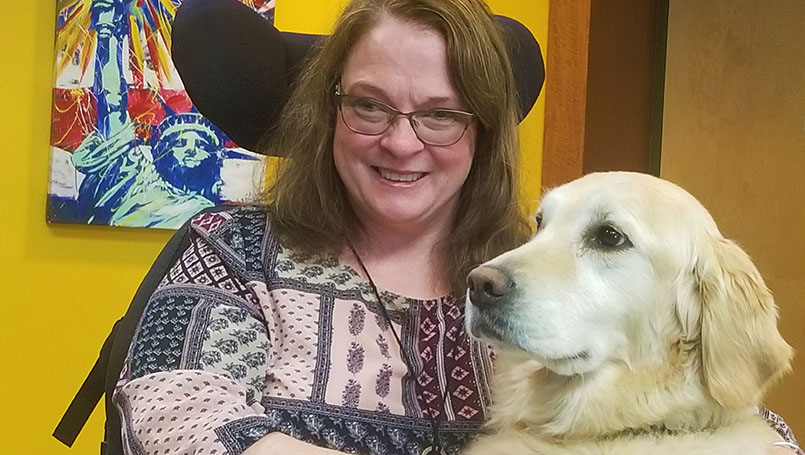 Sheryl with her service dog