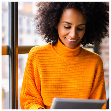 Woman using tablet to search for a new primary care physician