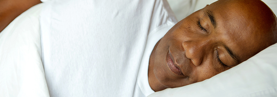 African American man sleeping peacefully